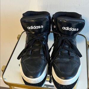 Adidas women’s Black and White High-Top Sneakers